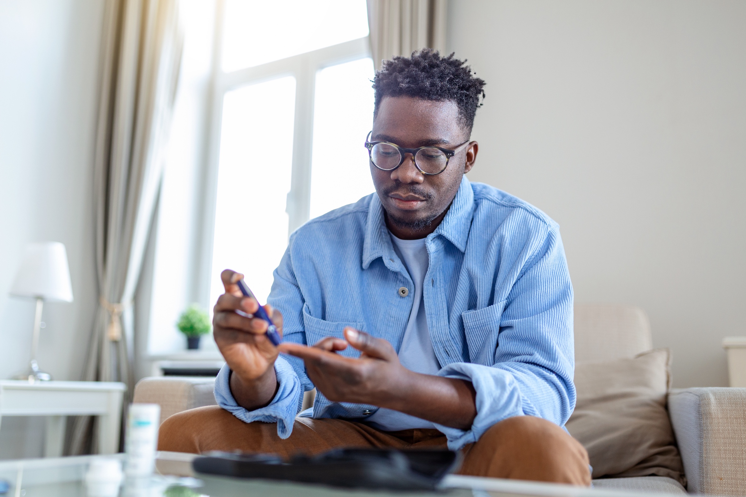 Person managing a chronic illness through online telehealth care